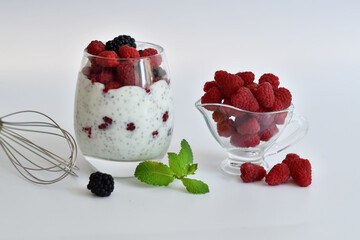 Healthy food and breakfast. glass of delicious homemade smoothie, dessert made from chia and...