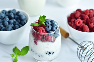 Healthy food and breakfast. glass of delicious homemade smoothie, dessert made from chia and berries. delicious milkshake, vegan raw food. Summer card. Good morning.Selective focus.
