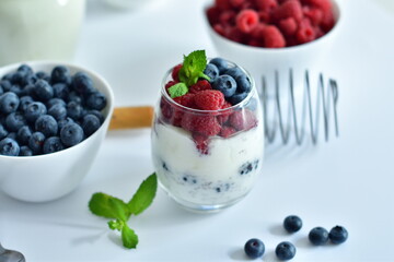 Healthy food and breakfast. glass of delicious homemade smoothie, dessert made from chia and...