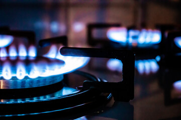 Gas stove - burning blue flames on gas cooker
