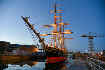 Illuminated clipper ship in the port of Den Helder, Holland.