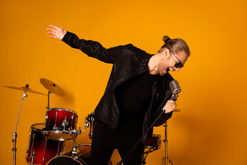 Photo of cool handsome vocalist guy singing retro old fashion microphone repetition important...
