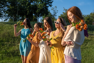 Women's Equality Day, Girl power, diversity, femininity concept. Group of five happy young women...