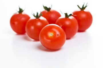 fresh cherry tomatoes on a white background