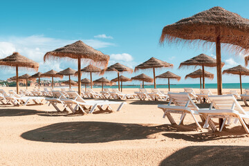 Empty deck chairs at beach during quarantine times