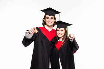 Two graduate students couple pointed on camera isolated on white background