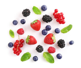 Assorted wild fresh berries isolated on white background. Top view.