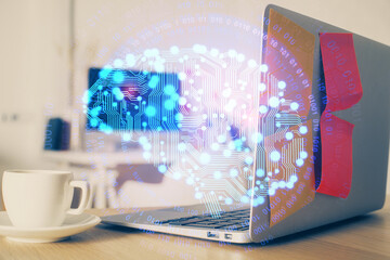 Fototapeta premium Double exposure of work space with computer and human brain drawing hologram. Brainstorm concept.