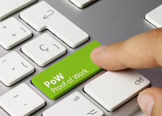 PoW Proof of Work - Inscription on Green Keyboard Key.