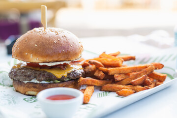 Close up of hamburger and chips food.