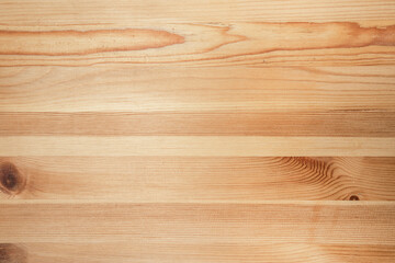 background of unpainted wooden boards of yellow color, natural texture