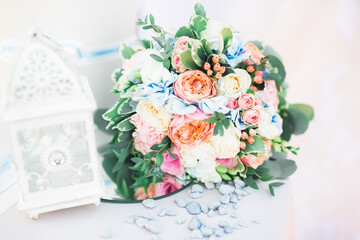 Beautiful wedding bouquet with different flowers, roses