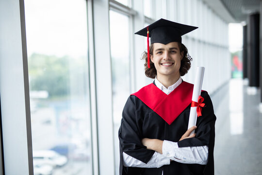 Graduate male student - graduation concepts. Portrait on his graduation day. University. Education, people concept.