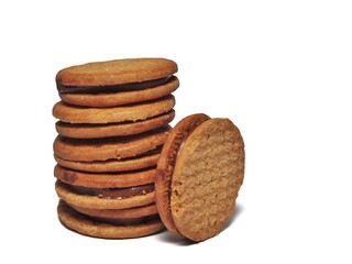 Oatmeal biscuits with chocolate cream isolated on white background