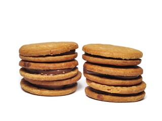 Oatmeal biscuits with chocolate cream isolated on white background