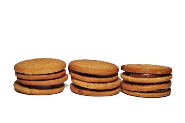 Oatmeal biscuits with chocolate cream isolated on white background