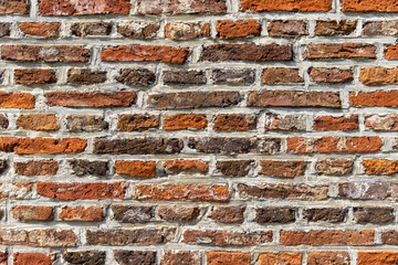 an old brick wall, part of the old home of the beguines in Diest, Belgium
