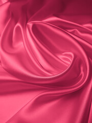 Obraz premium Beautiful elegant wavy light pink satin silk luxury cloth fabric texture, abstract background design. Copy space