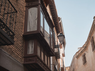 Facade of an old building in Toledo. Nice design. Spring day