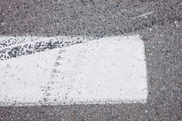 Fototapeta premium Special street marks with white color and lines and corner, like parking place, no person and space for text and background