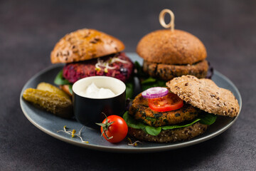 Vege burgers with carrots, beetroots and mushrooms.