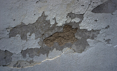    cracked cement covered with gray cement surface as background for design                      