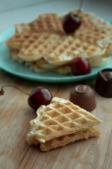 Belgian waffles with cherries and chocolates