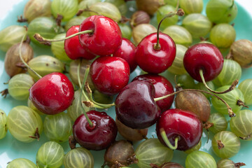 background of gooseberries and cherries