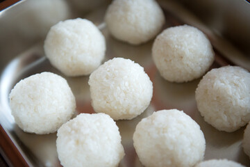 Rice balls in an iron bowl for making sushi and rolls.