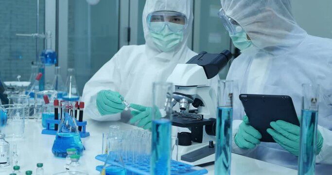 Two Scientists Working On Coronavirus Vaccine At Lab. 