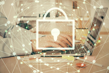 Double exposure of lock icon with man working on computer on background. Concept of network security.