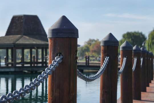 Perspective of wooden poles on the bridge.
