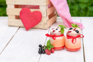 Pudding for Breakfast with fresh berries outside.