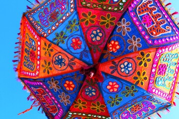 Umbrella hanging in the sky, colorful umbrella