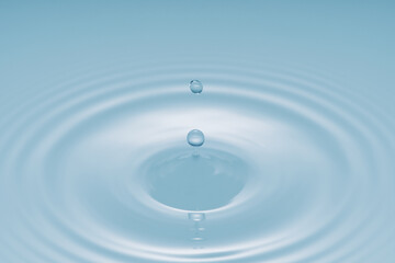 Water Drop - Pure clear and transparent of water and ripple in bright background. Creative modern concept, for graphic design, website, poster, placard and wallpaper.