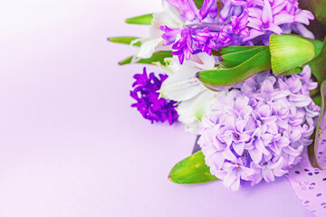 Bouquet of fresh purple flowers close up, holiday background. Mockup with copy space