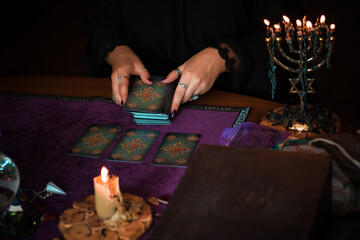  Tarot cards, Concept of fortune telling and predictions, magical rituals and wicca elements on a table