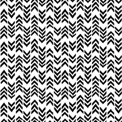 Chevron seamless pattern. Hand-drawn zig zag in black on a mural background. Weaving pattern. Vector illustration for paper, textile and style teenager, teens and children.