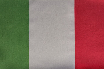 National emblem of Italy. Flag of the Italian Republic on close up. Tricolor flag green white red