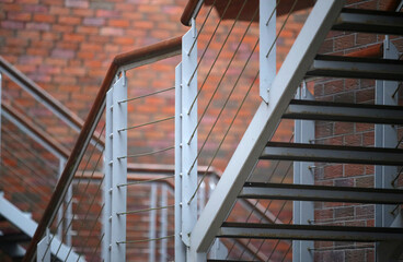Metal stairs in a residential house loft type after the rain. Lithuania, Nida