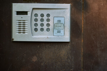 intercom on the front door. door with a lock