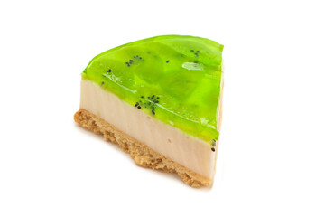 Piece of kiwi cheesecake isolated on white.