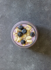 Yogurt with blueberries and almonds. Healthy eating. Vegetarian food. Breakfast. Dessert.