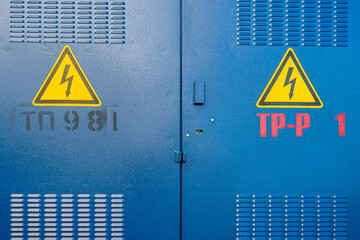 Rostov-na-donu, Russia - June, 2020: blue doors of transformer station, sign "caution high voltage"