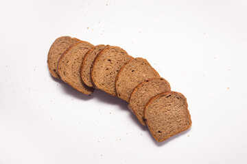 Assortment of baked bread on white background