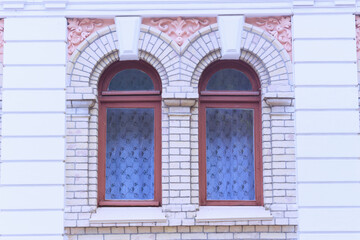 Beautiful traditional window with wooden shutters