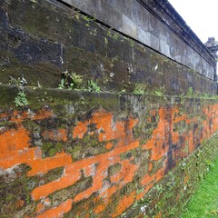 Weathered old Brick Temple Wall with Moss, Bali, Indonesia