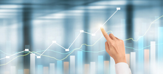 Hand  plan graph growth and increase of chart positive indicators in his business