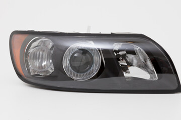 car spare part headlights on white background