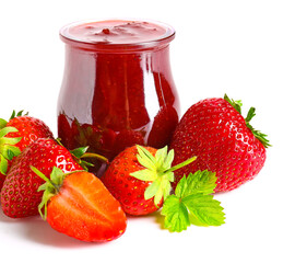 Jar of tasty strawberry jam on white background
